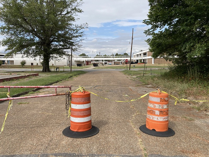 Security measures have been increased in and around Pine Bluff High School. One measure that has been in place is the blocking off of some streets around the high school (shown here). (Pine Bluff Commercial/Byron Tate)