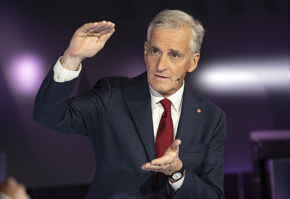 FILE - In this Tuesday, Aug. 31, 2021 file photo, Labor leader Jonas Gahr Store speaks during a party leader debate on TV2, in Bergen, Norway. As Norwegians head to the polls on Monday, Sept. 13, fears about climate change have put the future of the North Sea oil and gas industry at the top of the campaign agenda. The ruling Conservatives, led by Prime Minister Erna Solberg, and the opposition Labor Party, which is leading in opinion polls, both advocate for a gradual move away from the fossil fuels that continue to underpin the economy. (Marit Hommedal/NTB via AP)