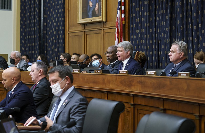 Rep. Michael McCaul, R-Texas, ranking member of the House Foreign Affairs Committee, joined at left by Chairman Gregory Meeks, D-N.Y., discuss the U.S. withdrawal from Afghanistan with Secretary of State Antony Blinken who appeared remotely, at the Capitol in Washington, Monday, Sept. 13, 2021. (AP Photo/J. Scott Applewhite)