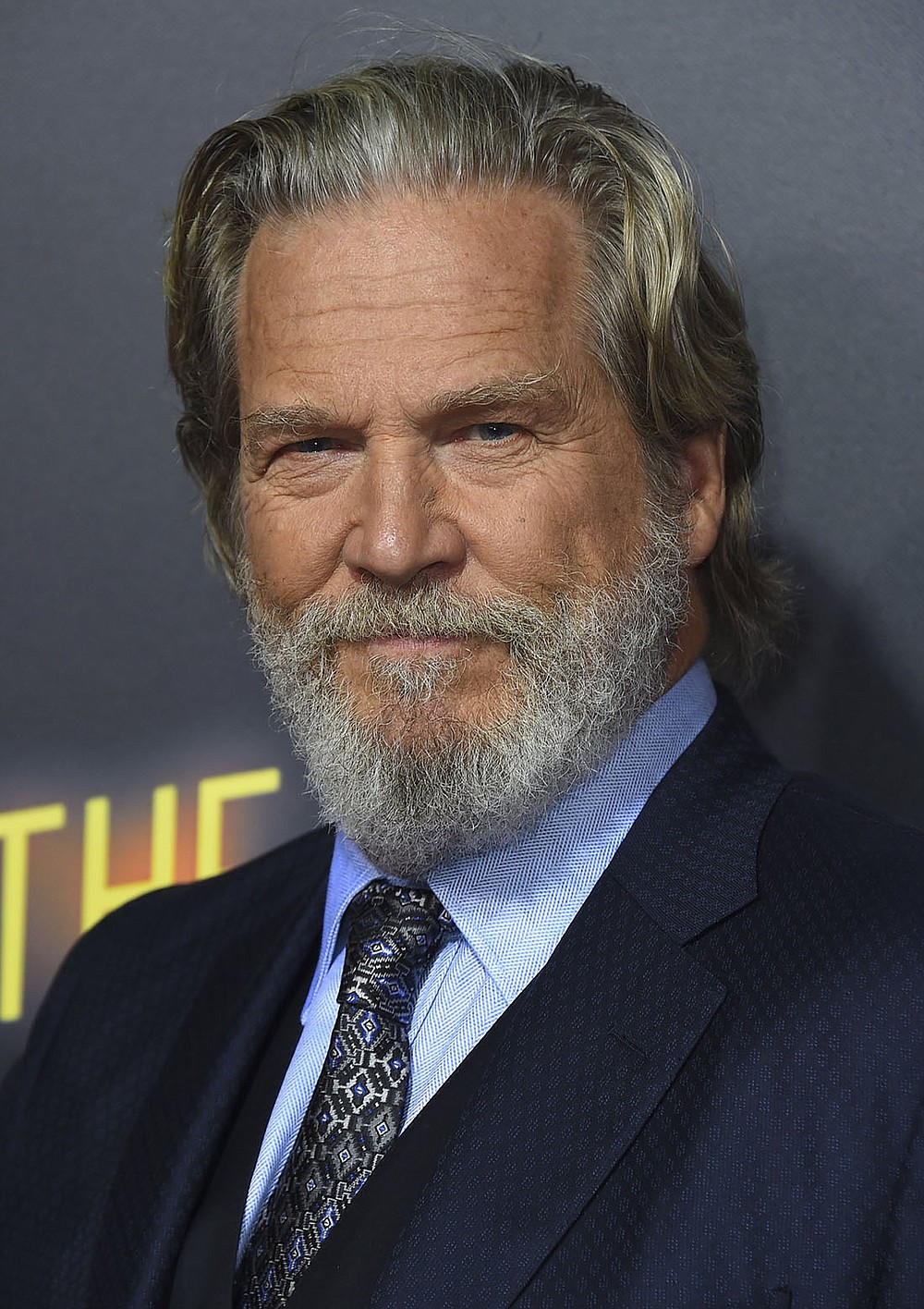 FILE - In this Sept. 22, 2018 file photo, Jeff Bridges arrives at the Los Angeles premiere of "Bad Times at the El Royale." The Hollywood Foreign Press Association announced Monday that Bridges will be honored with the Cecil B. DeMille Award at the Golden Globe Awards ceremony on Jan. 6, 2019. The actor is known for starring in films including "Crazy Heart,"ù "The Big Lebowski,"ù "True Grit"ù and "Hell or High Water."ù (Photo by Jordan Strauss/Invision/AP, File)