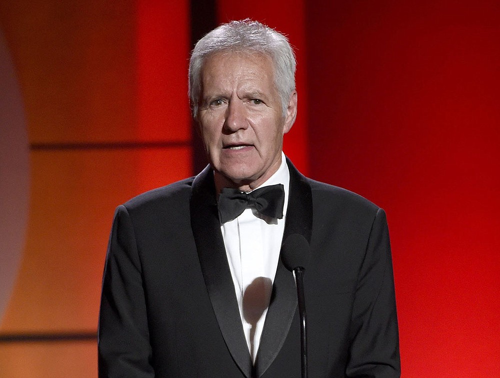 FILE - In this April 30, 2017, file photo, Alex Trebek speaks at the 44th annual Daytime Emmy Awards at the Pasadena Civic Center in Pasadena, Calif. The "Jeopardy!" host says his response to advanced pancreatic cancer treatment is "kind of mind-boggling" and his doctors say the 78-year-old is in "near remission." Trebek tells People magazine he's responding very well to chemotherapy and the doctors have told him "they hadn't seen this kind of positive results in their memory." Trebek says some of the tumors have shrunk by more than 50%. (Photo by Chris Pizzello/Invision/AP, File)
