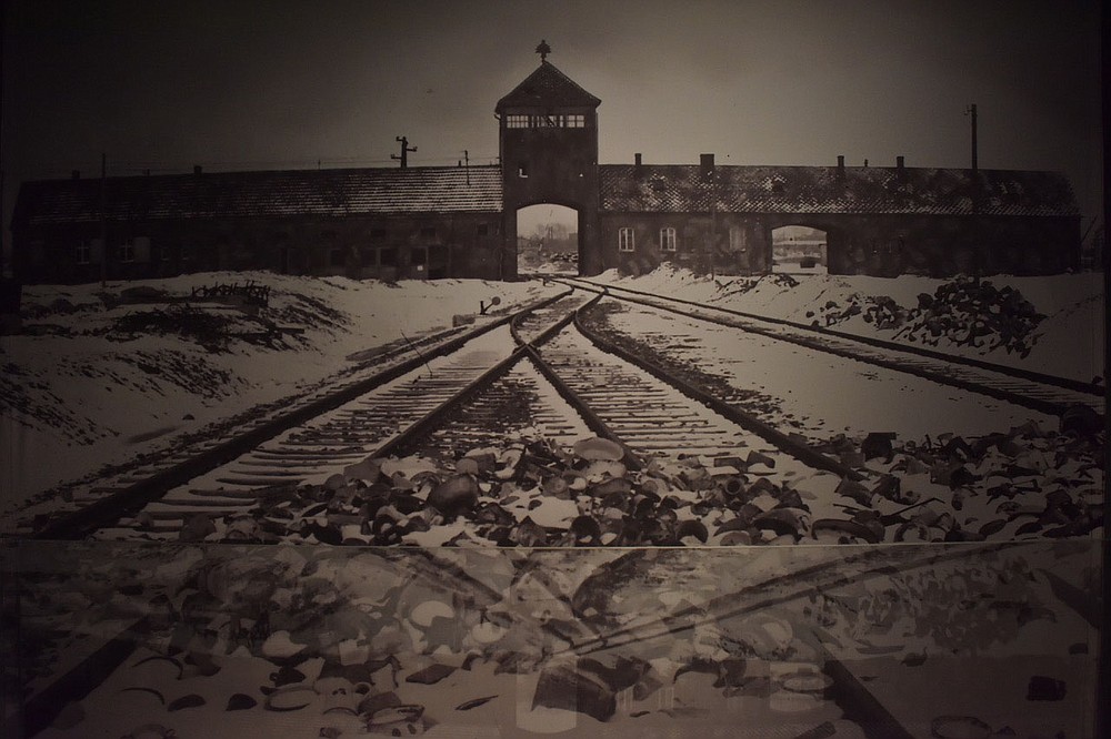 All over the world, Auschwitz has become a symbol of terror, genocide and the Shoah. It was established by Germans in 1940, in the suburbs of the Polish city of Oswiecim and became the largest of the extermination centers where the “Endlösung der Judenfrage” (the final solution to the Jewish question — the Nazi plan to murder European Jews) was carried out, according to the Auschwitz-Birkenau Memorial and Museum. This image of the main gate was taken from inside the camp after the liberation.
(Pawel Sawicki, Auschwitz Memorial)