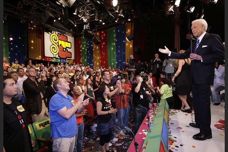 Game show host Bob Barker, 83, receives a standing ovation as he tapes his final episode of “The Price Is Right” in Los Angeles in 2007. The longest-running game show in television history is celebrating it’s 50th season. (Damian Dovarganes/AP file)