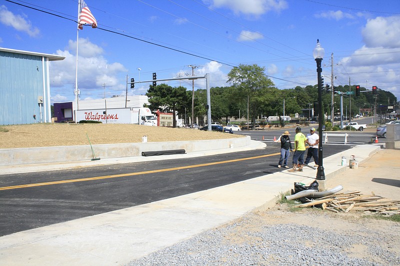 Fifth Street at Northwest Avenue reopened yesterday, Public Works Director Robert Edmonds said, after several months of work that stretched from that intersection to the intersection of Fifth and College Avenue. (Matt Hutcheson/News-Times)