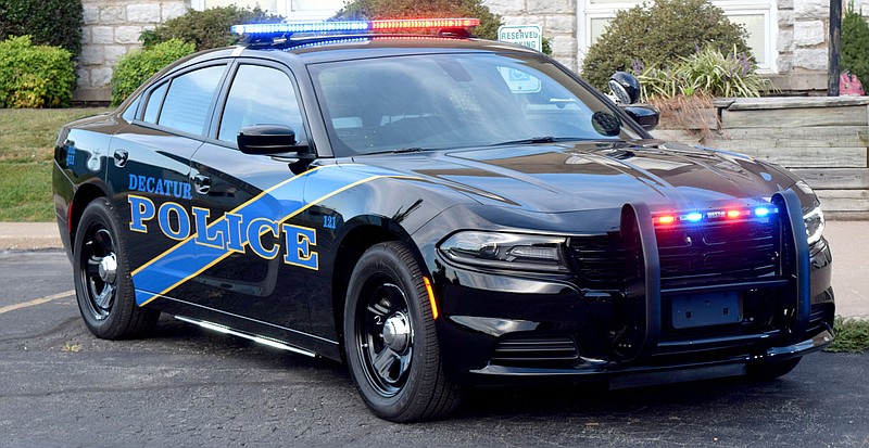 Westside Eagle Observer/MIKE ECKELS
The Decatur Police Department's newest police cruiser was briefly on display at Decatur City Hall Sept. 15 before the unit took to the streets on its first patrol. The purchase of the 2021 Dodge Charger was approved by the city council during the July 26 meeting.