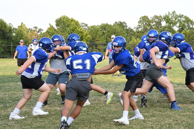 The Jessieville Lions run a drill during a practice last month at the school. The Lions host the Dierks Outlaws tonight at 7 p.m. - Photo by Tanner Newton of The Sentinel-Record