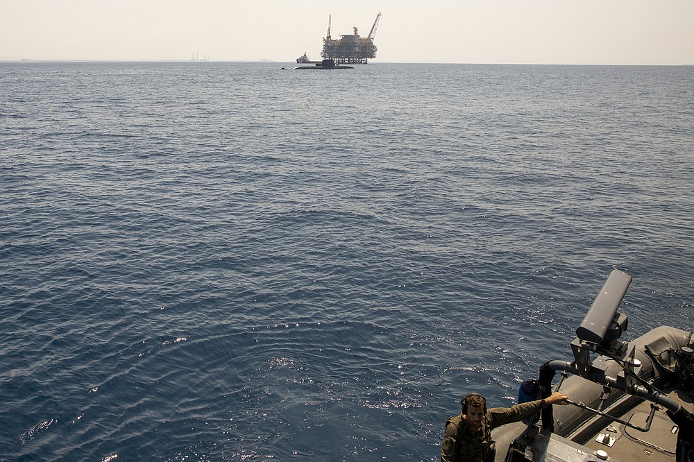 Israel's offshore Leviathan gas field is seen from on board the Israeli Navy Ship Atzmaut as a submarine patrols, in the Mediterranean Sea, Wednesday, Sept. 1, 2021. Speaking to The Associated Press days after completing his five-year term, Sharvit described Iranian activities on the high seas as a top Israeli concern and said the navy is able to strike wherever necessary to protect the country’s economic and security interests. (AP Photo/Ariel Schalit)