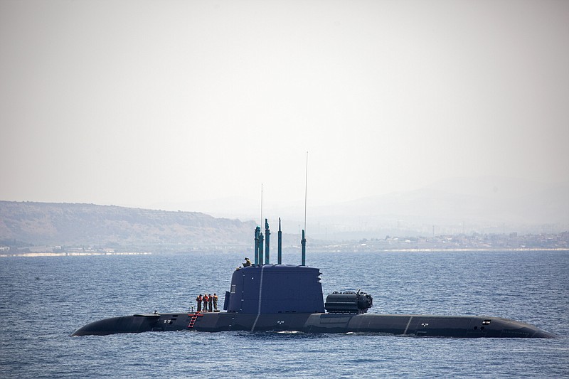 An Israeli Navy submarine is seen near Israel's offshore Leviathan gas field in the Mediterranean Sea, Wednesday, Sept. 1, 2021. In an interview with the Associated Press, Israel's just-retired navy chief Vice Adm. Eli Sharvit, described Iranian activities on the high seas as a top Israeli concern and said the navy is able to strike wherever necessary to protect the country&#x2019;s economic and security interests. (AP Photo/Ariel Schalit)