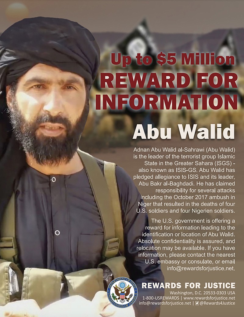 This undated image provided by Rewards For Justice shows a wanted posted of Adnan Abu Walid al-Sahrawi, the leader of Islamic State in the Greater Sahara. French President Emmanuel Macron announced the death of al-Sahrawi Wednesday, Sept. 15, 2021, calling the killing &#x201c;a major success&#x201d; for the French military after more than eight years fighting extremists in the Sahel. Macron tweeted that al-Sahrawi &#x201c;was neutralized by French forces&#x201d; but gave no further details.  (Rewards For Justice via AP)