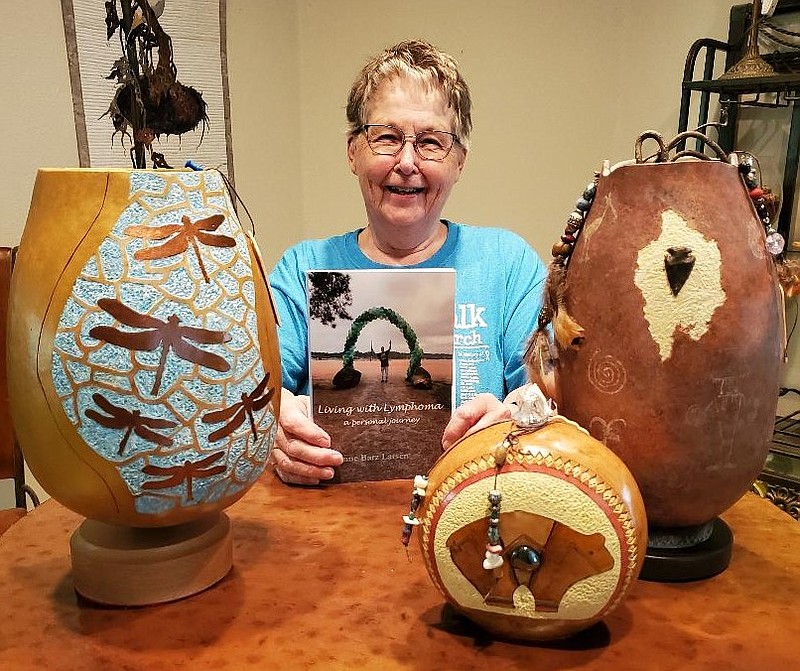 Artist Jeanne Larsen with her book, “Living with Lymphoma, a Personal Journey.” - Submitted photo