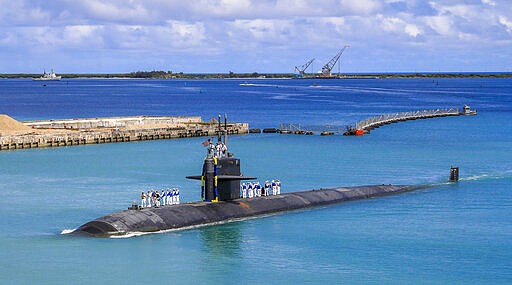 In this photo provided by U.S. Navy, the Los Angeles-class fast attack submarine USS Oklahoma City (SSN 723) returns to U.S. Naval Base in Guam, Aug. 19, 2021. Australia's Prime Minister Scott Morrison on Friday, Sept. 17, rejected Chinese criticism of Australia's new nuclear submarine alliance with the United States and said he doesn&#x2019;t mind that President Joe Biden might have forgotten his name. (Mass Communication Specialist 3rd Class Naomi Johnson/U.S. Navy via AP)