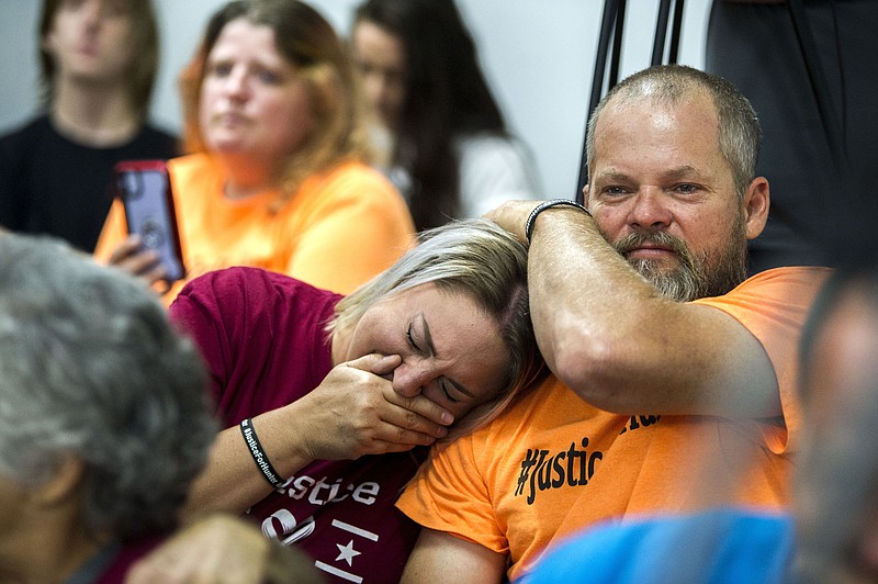 Family and friends of Hunter Brittain became emotional as they listened to Special Prosecutor Jeff Phillips announce his decision to charge former Lonoke county Deputy Michael Davis with Felony Manslaughter during a press conference at the Pope County Courthouse in Russellville on Friday, Sept. 17, 2021. (Arkansas Democrat-Gazette/Stephen Swofford)