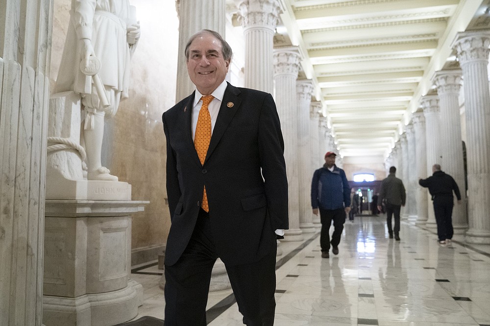 House Budget Committee Chair John Yarmuth, D-Ky., walks through the Hall of Columns at the Capitol as House Democratic chairs gather for a meeting with Majority Leader Steny Hoyer, D-Md., in Washington, Wednesday, March 27, 2019. (AP Photo/J. Scott Applewhite)