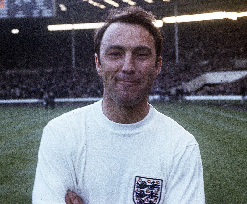 FILE  - In this 1967 file photo, England football forward Jimmy Greaves stands on the pitch at Wembley, England, prior to an international soccer match. Jimmy Greaves, one of England&#x2019;s greatest goal-scorers who was prolific for Tottenham, Chelsea and AC Milan has died. He was 81. With 266 goals in 379 appearances, Greaves was the all-time record scorer for Tottenham, which announced his death on Sunday, Sept. 19, 2021. (AP Photo, File)