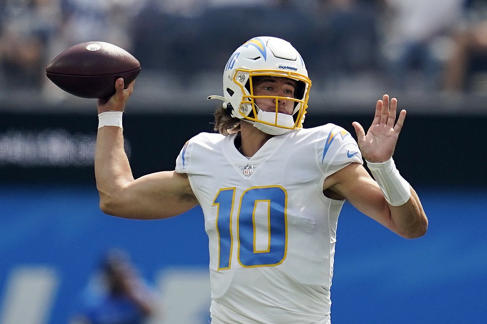 Quarterback (4) Dak Prescott of the Dallas Cowboys drops back to pass  against the Los Angeles Chargers in an NFL football game, Sunday, Sept. 19,  2021, in Inglewood, Calif. The Cowboys defeated