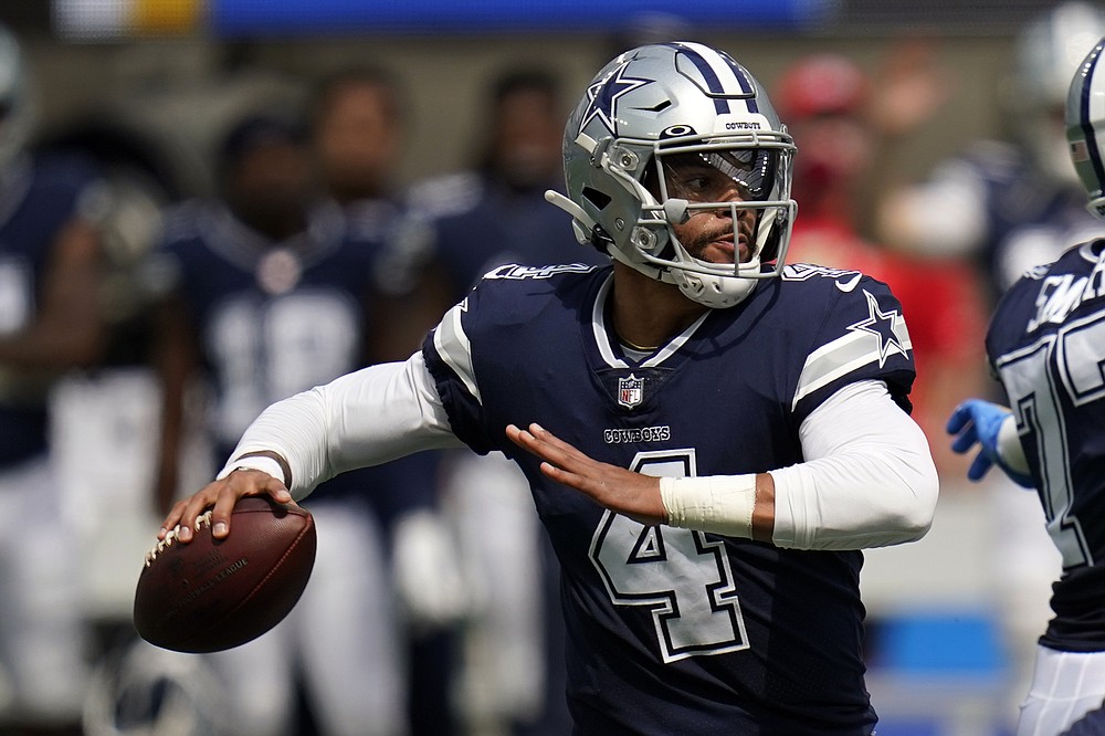 Quarterback (4) Dak Prescott of the Dallas Cowboys calls a play against the  Los Angeles Chargers in an NFL football game, Sunday, Sept. 19, 2021, in  Inglewood, Calif. The Cowboys defeated the