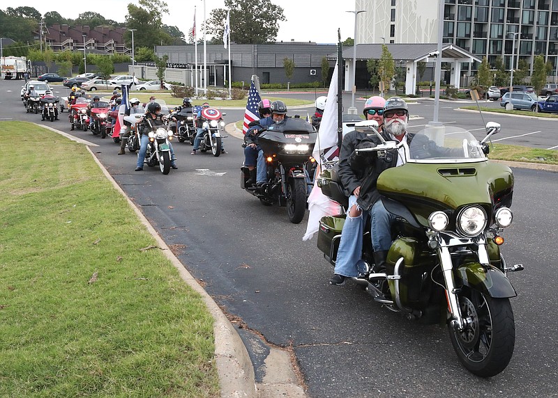 Participants in the 29th Annual Trail of Tears Commemorative Motorcycle Ride leave for DeQueen from Hot Springs Monday morning after spending the night. - Photo by Richard Rasmussen of The Sentinel-Record