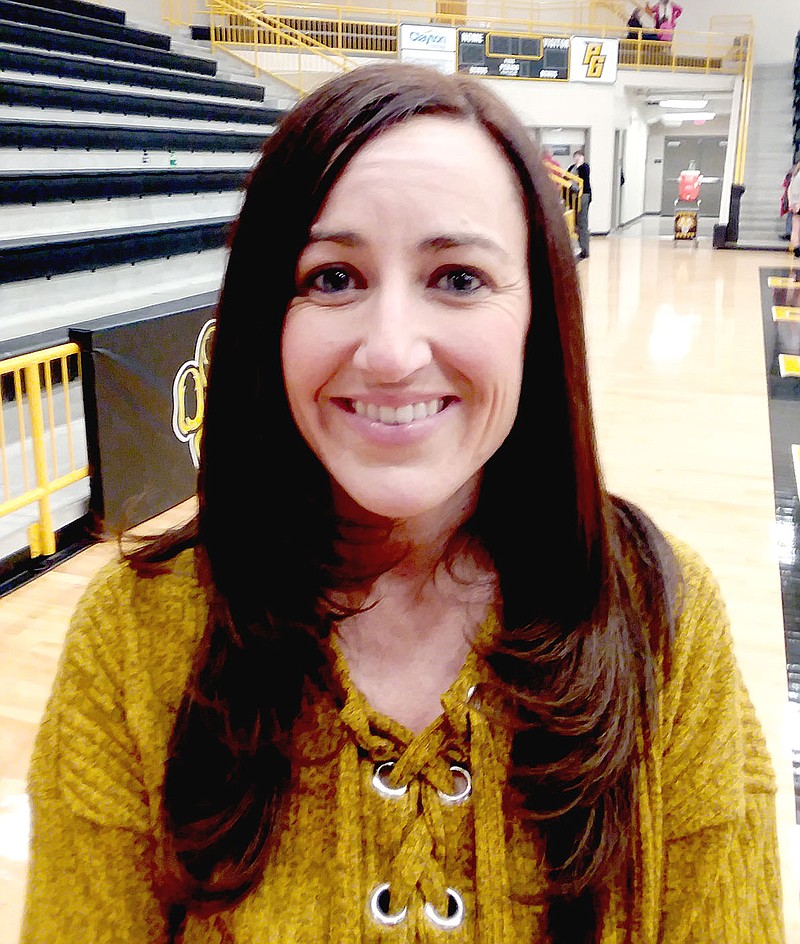 MARK HUMPHREY  ENTERPRISE-LEADER/Former Prairie Grove varsity assistant and head junior high girls basketball coach Shelley Dougan faced many challenges during her 15-year coaching career, but now faces an even bigger challenge caring for her husband, Dustin, who suffered a stroke after having his left eye removed during the spring.