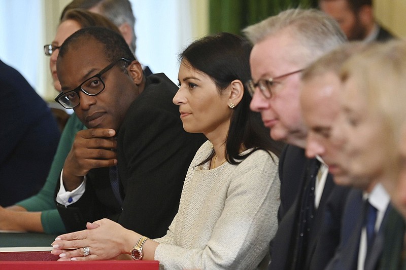 From left, Britain's Business Secretary Kwasi Kwarteng, Home Secretary Priti Patel, Housing Secretary Michael Gove, Justice Secretary and deputy Prime Minister Dominic Raab, and Foreign Secretary Liz Truss, participate in the first Cabinet meeting since the reshuffle, at 10 Downing Street, in London, Friday, Sept. 17, 2021. (Ben Stansall/Pool Photo via AP)