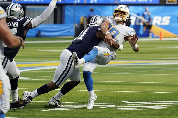 Quarterback (4) Dak Prescott of the Dallas Cowboys calls a play against the  Los Angeles Chargers in an NFL football game, Sunday, Sept. 19, 2021, in  Inglewood, Calif. The Cowboys defeated the