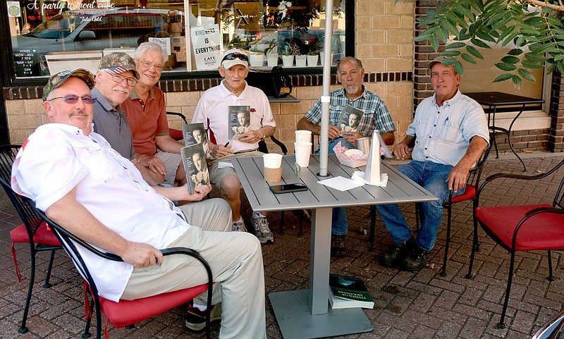 Marc Hayot/Herald-Leader Robert "Bob" Gray (third from right) poses with Randy Steele, Ron Harp, Hank Harrison, Griff Palmer and Joe Woolbright with copies of his new book "The Life and Stories of Robert Gray." Gray, 93, had the idea five years earlier when his friend Kelly McInroy said he should write a book. Gray's book was released on Amazon on Aug. 14.