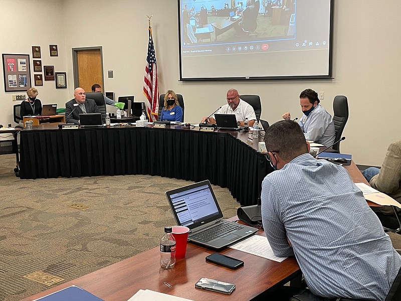 NWA Democrat-Gazette/DAVE PEROZEK The Bentonville School Board discusses the School District's mask mandate during its meeting Tuesday, Sept. 21, 2021.