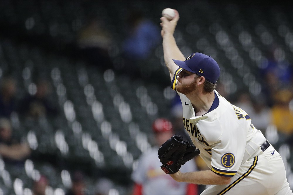 Woodruff pitches seven scoreless innings to lift NL Central-leading Brewers  over Pirates 7-3