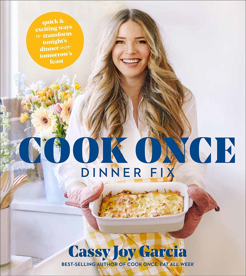 This cover image released by Simon &amp; Schuster shows &quot;Cook Once Dinner Fix: Quick and Exciting Ways to Transform Tonight's Dinner into Tomorrow's Feast&quot; by Cassy Joy Garcia. (Simon &amp; Schuster via AP)