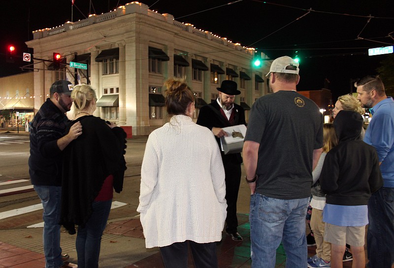 Paul Prater leads a a 2018 Haunted Argenta Tour in downtown North Little Rock. (Democrat-Gazette file photo/Sean Clancy)