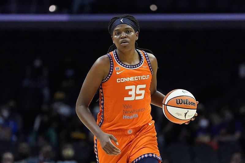 Connecticut Sun forward Jonquel Jones (35) controls the ball during the first half of a WNBA game against the Los Angeles Sparks in Los Angeles, Sept. 9. Jones is no stranger to winning Associated Press WNBA awards. In previous years, the forward has been honored by the media that votes on the weekly AP WNBA power poll as the Sixth Woman of the Year and Most Improved Player. This year, the 6-foot-6 Jones is the unanimous choice AP Player of the Year honors by the 14-member panel, announced Wednesday. - Photo by Ashley Landis of The Associated Press