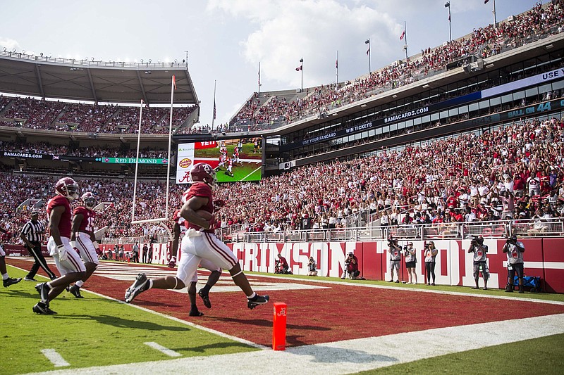 Alabama running back Jase McClellan (21) returns a blocked punt for a touchdown against Mercer during the first half, Sept. 11, in Tuscaloosa, Ala. - Photo by Vasha Hunt of The Associated Press