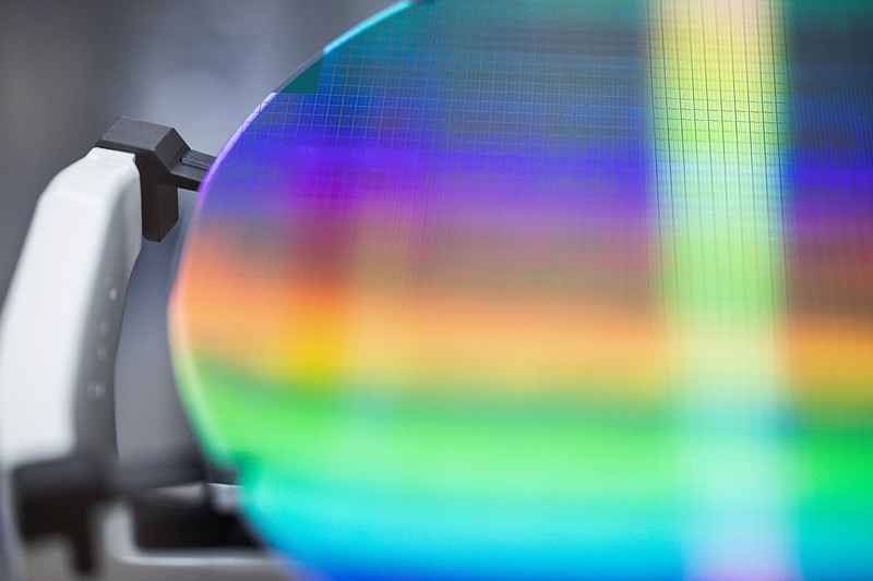 A 300 millimeter silicon wafer during the manufacturing process inside the new Infineon Technologies chip factory in Villach, Austria, on Sept. 16, 2021. MUST CREDIT: Bloomberg photo by Akos Stiller.