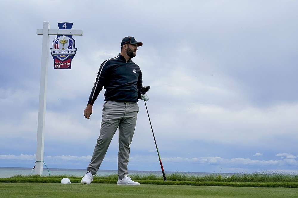 Team Europe's Jon Rahm watches his drive on the fourth hole during a practice day at the Ryder Cup at the Whistling Straits Golf Course Thursday, Sept. 23, 2021, in Sheboygan, Wis. (AP Photo/Charlie Neibergall)