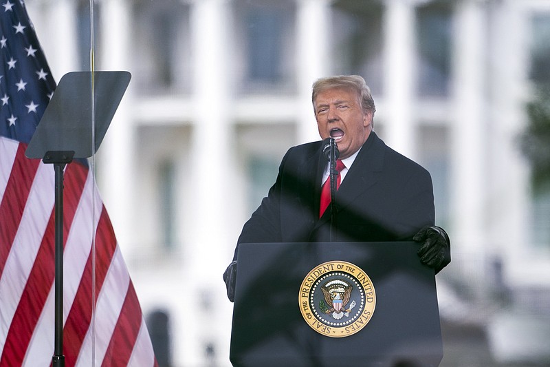 FILE - In this Jan. 6, 2021, file photo President Donald Trump speaks during a rally protesting the electoral college certification of Joe Biden as President in Washington. The Biden administration will have a big say in whether the government releases information to Congress on the actions of former president Donald Trump and his aides on Jan. 6. But there could be a lengthy court battle before any details come out. (AP Photo/Evan Vucci, File)