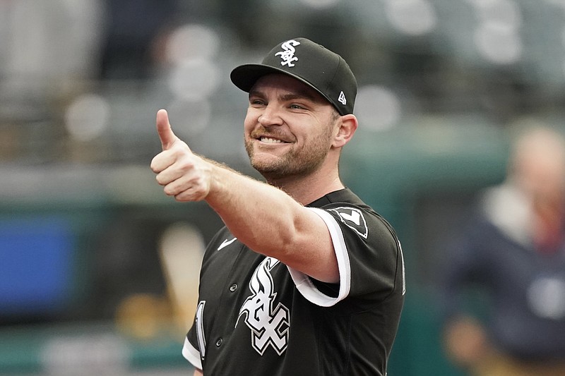 Chicago White Sox relief pitcher Liam Hendriks gives a thumbs-up after the team defeated the Cleveland Indians in the first baseball game of a doubleheader Thursday in Cleveland. The White Sox clinched the American League Central title with the win. - Photo by Tony Dejak of The Associated Press