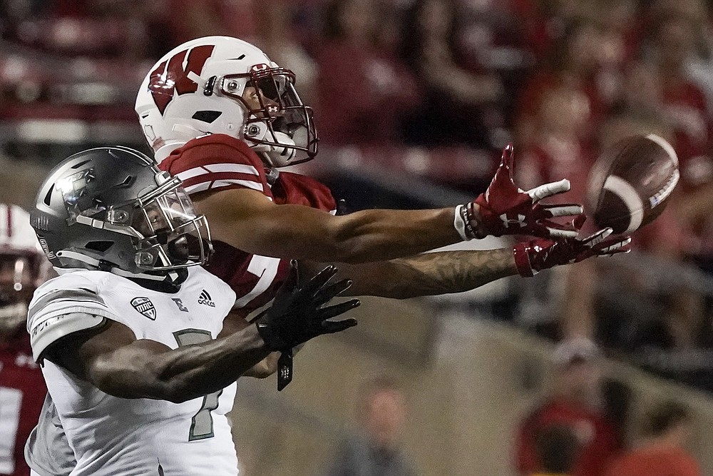 East Michigan's Freddie McGee III breaks a pass intended for Wisconsin's Danny Davis III during the second half of an NCAA college football game on Saturday, September 11, 2021 in Madison, Wis. (AP Photo / Morry Gash)