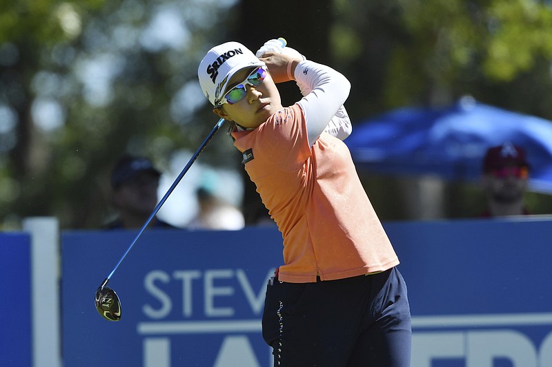 Nasa Hataoka, of Japan, watches her drive off the 9th tee during the second round of the LPGA Walmart NW Arkansas Championship golf tournament, Saturday, Sept. 25, 2021, in Rogers, Ark. (AP Photo/Michael Woods)