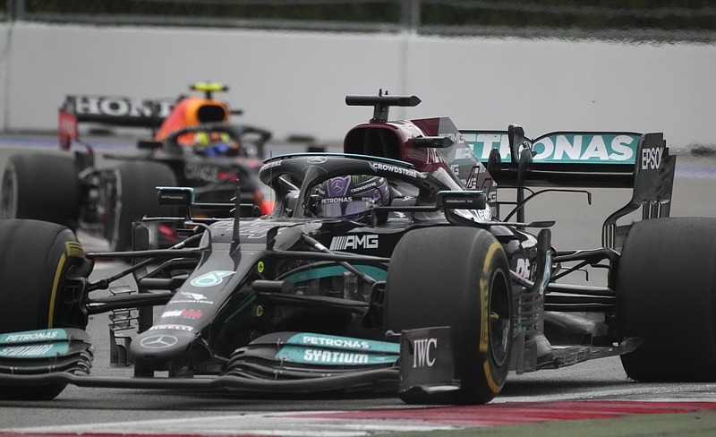 Mercedes driver Lewis Hamilton of Britain steers his car during the Russian Formula One Grand Prix at the Sochi Autodrom circuit, in Sochi, Russia, Sunday, Sept. 26, 2021. (AP Photo/Sergei Grits)