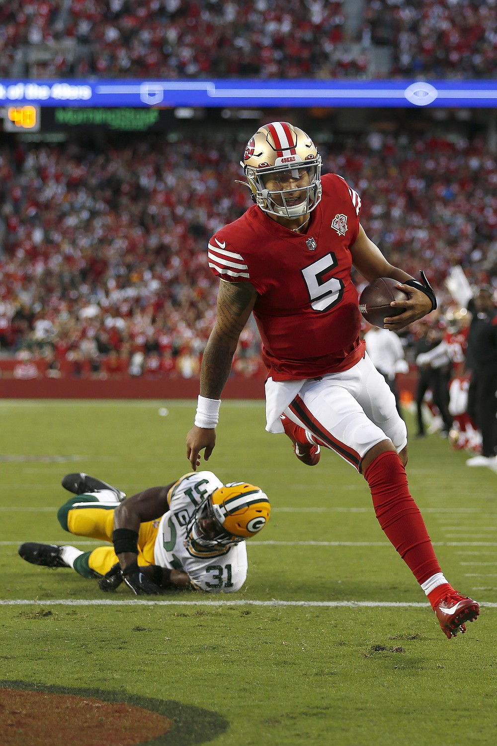 Niners rally, but can't control Rodgers at end