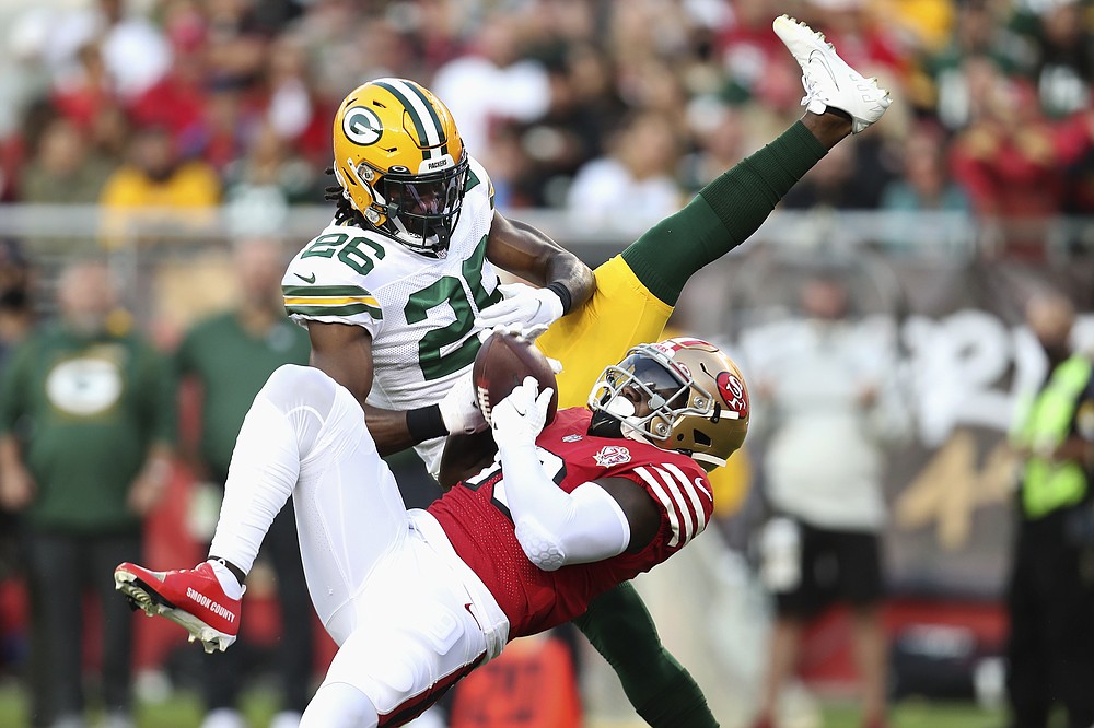 Niners rally, but can't control Rodgers at end