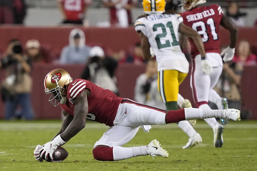 Niners rally, but can't control Rodgers at end