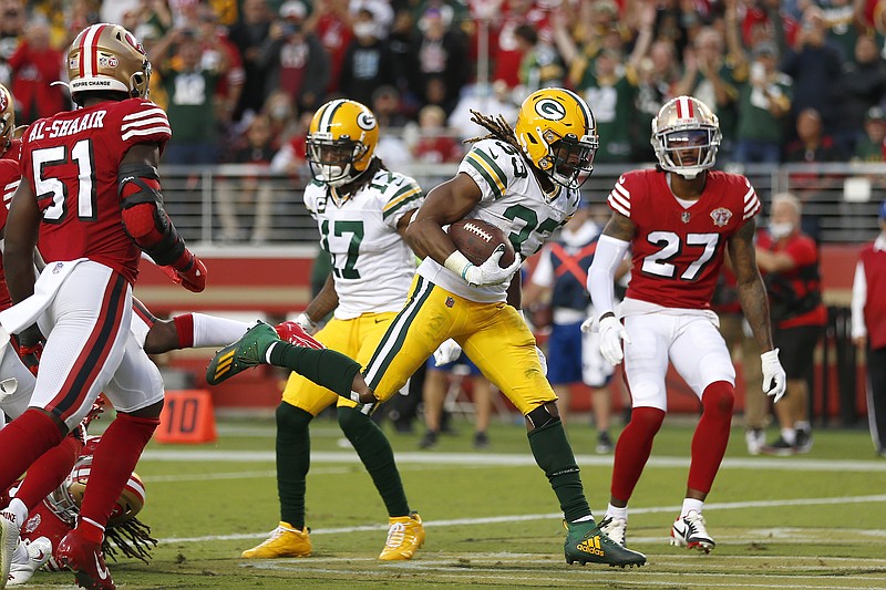 Niners rally, but can't control Rodgers at end
