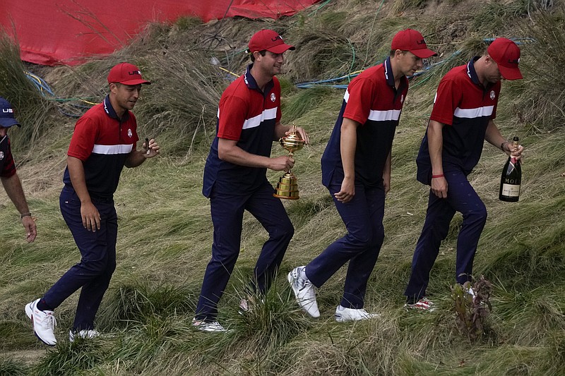 Team USA players head to the clubhouse after the Ryder Cup matches at the Whistling Straits Golf Course Sunday in Sheboygan, Wis. - Photo by Charlie Neibergall of The Associated Press