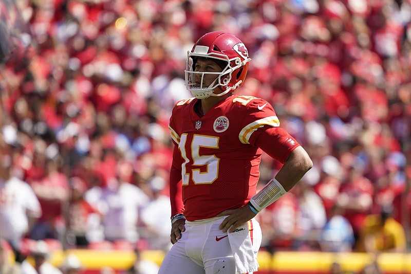 Kansas City Chiefs quarterback Patrick Mahomes (15) watches during the first half of an NFL football game against the Los Angeles Chargers, Sunday, Sept. 26, 2021, in Kansas City, Mo. (AP Photo/Ed Zurga)