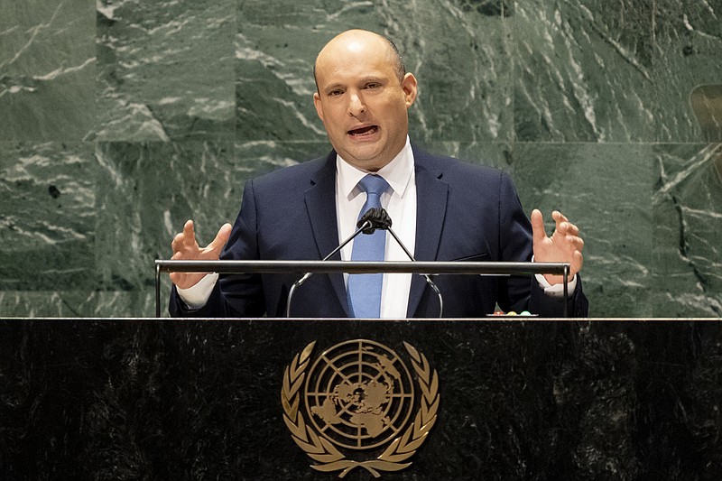 Israel's prime minister Naftali Bennett addresses the 76th Session of the United Nations General Assembly, Monday, Sept. 27, 2021, at U.N. headquarters. (AP Photo/John Minchillo, Pool)