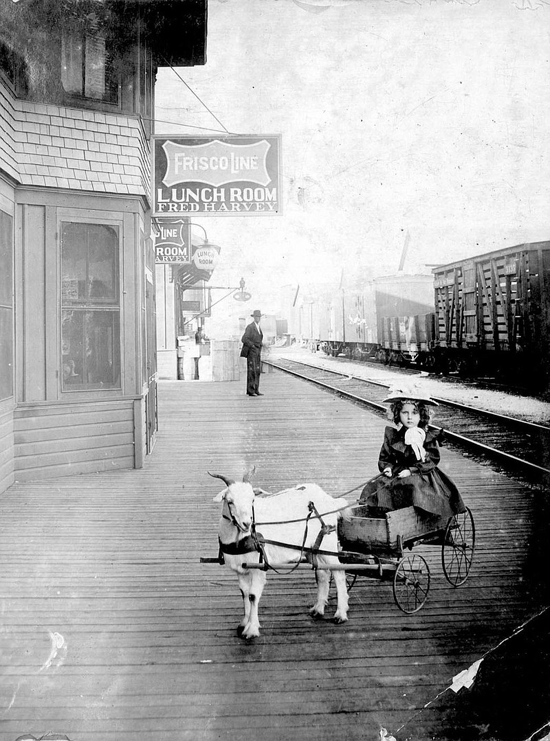 A girl in a goat cart pauses in front of the Rogers Harvey House restaurant about 1900. The photo is looking north with the second Frisco Depot in the background. Today, these buildings would be in Railyard Park.

(Photo/Domino Danzero, chef at the Harvey House)