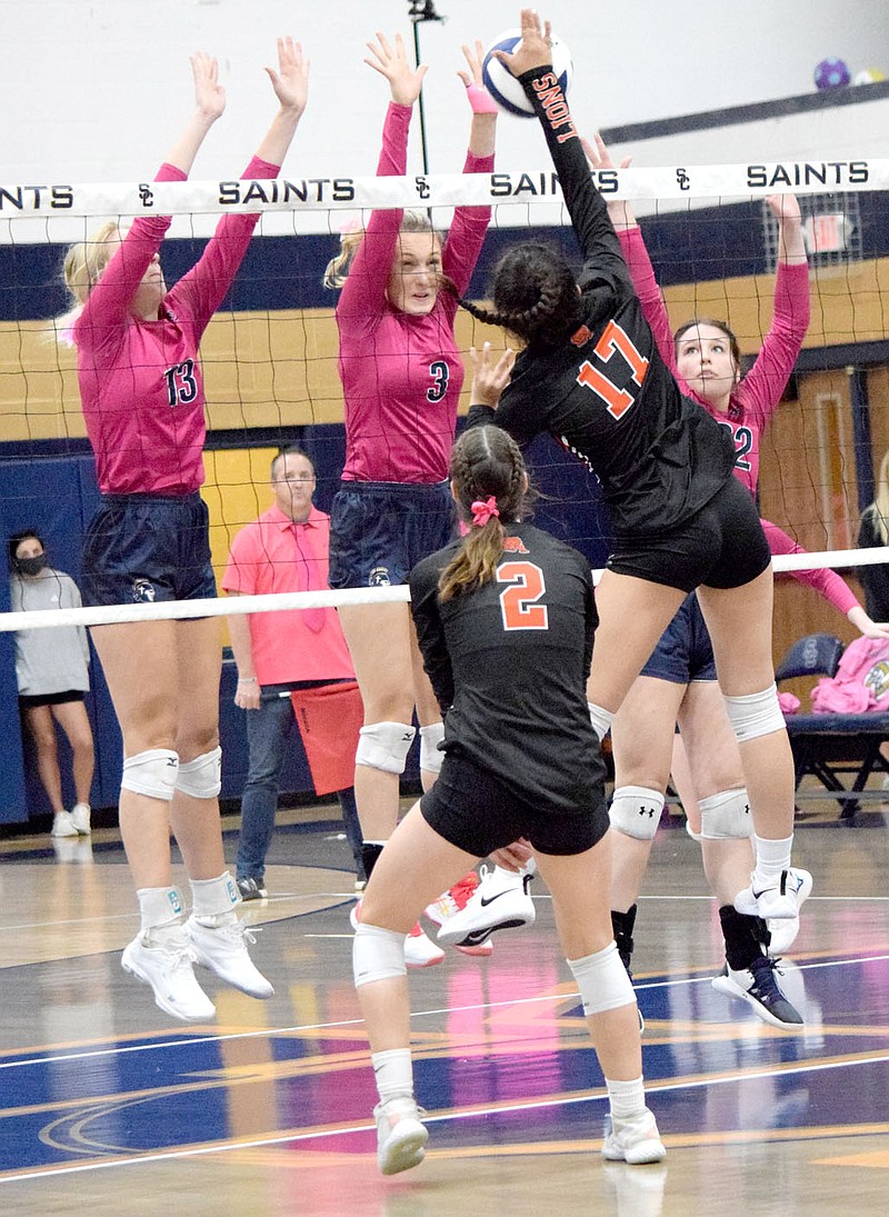 Westside Eagle Observer/MIKE ECKELS

Lady Lion Ella Pinches (Gravette 17) launches the ball back over the net into the front row of the Lady Saints during the Sept. 28 Shiloh Christian-Gravette conference volleyball match at the Saints' gym in Springdale.
