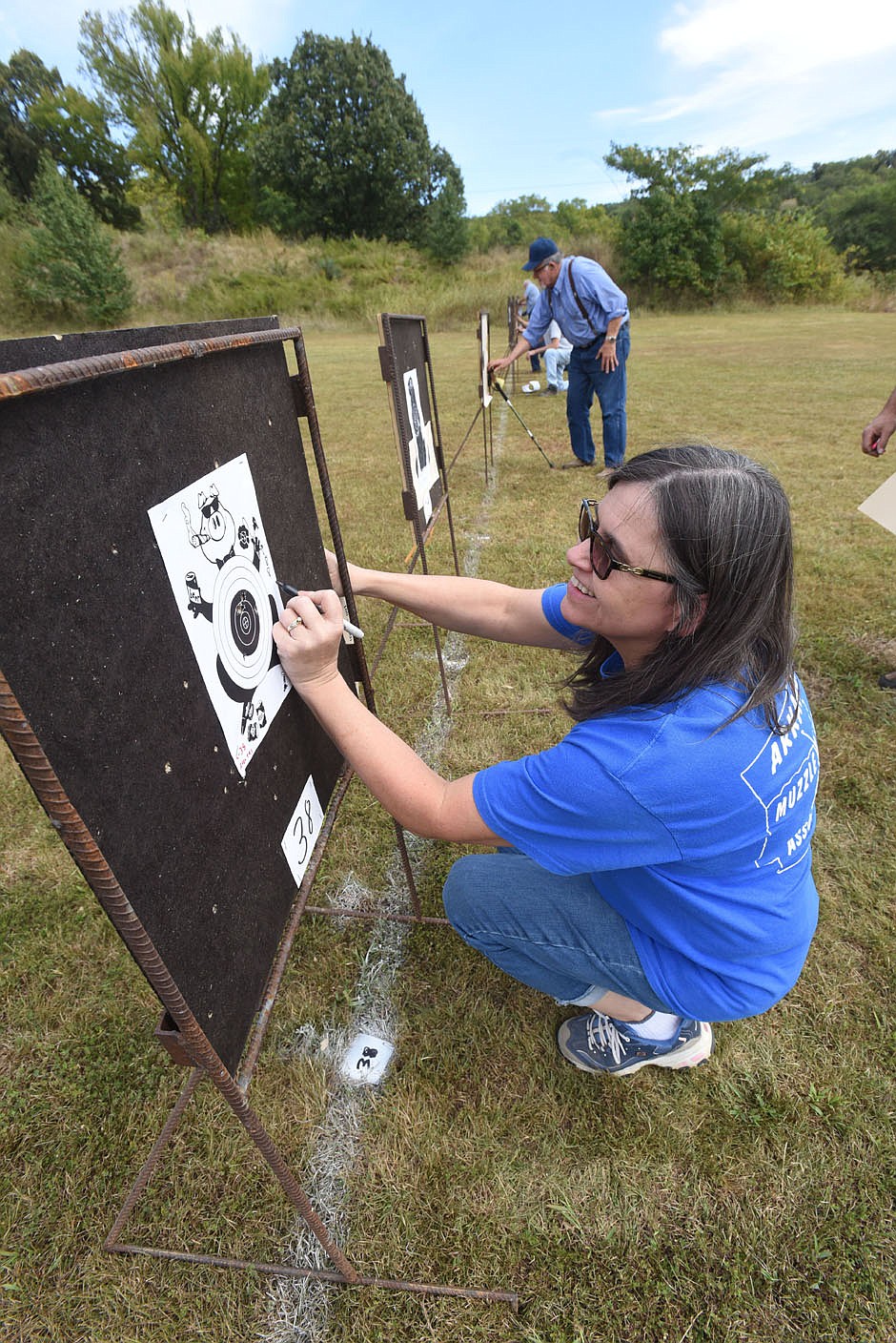 Angie Reynolds of Russellville adds up her score Sept. 24 2021 after shooting her muzzle-loading rifle.
(NWA Democrat-Gazette/Flip Putthoff)
