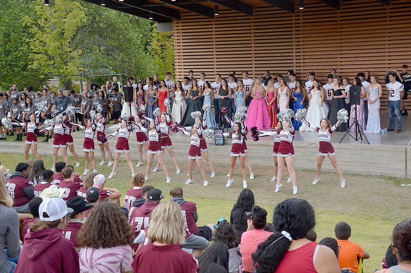 Graham Thomas/Siloam Sunday
Siloam Springs cheerleaders perform at a pep rally Wednesday in the Chautauqua Amphitheater in Memorial Park.