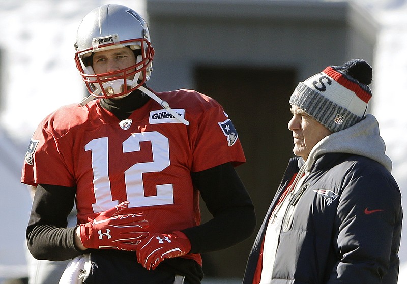 New England Patriots quarterback Tom Brady, left, stands with head coach Bill Belichick, right, during an NFL practice on Jan. 18, 2018, in Foxborough, Mass. Without Belichick, Brady won his seventh Super Bowl and is on pace to throw a career-high 53 touchdown passes at age 44. Without Brady under center, Belichick is 54-61 over his career, including 8-11 since the future Hall of Fame quarterback left New England for Tampa Bay. - Photo by Steven Senne of The Associated Press